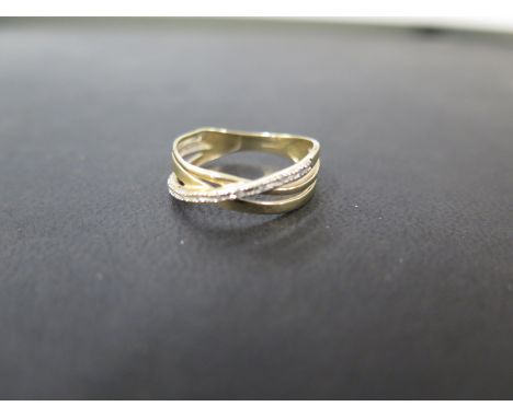 A 9ct gold diamond crossover ring - Hallmarked Birmingham - Ring size O 1/2 - Weight approx 1.8gms
Condition Report: Good - W