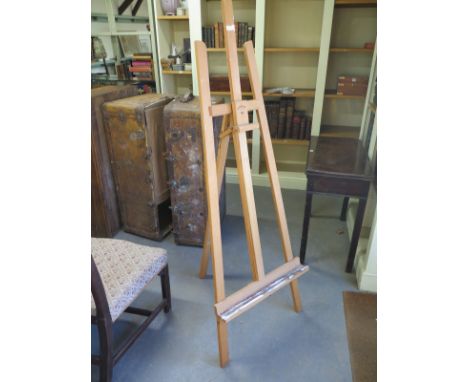 A beech wood easel by Winsor & Newton - Height 163cm
Condition report: Structurally good with old paint to base
