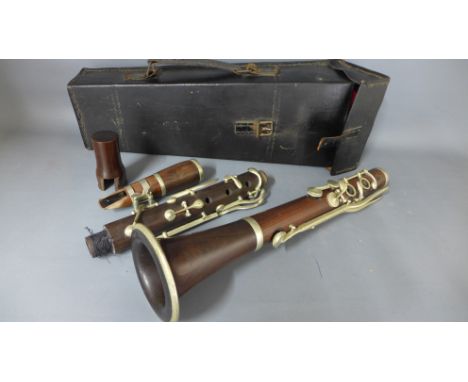 A rosewood Clarinet with case
Condition report: Some usage marks, small chips etc. no obvious cracks, tarnishing to metal wor