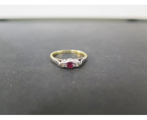 A ruby and diamond three-stone ring - Stamped 18ct and plat - Ring size L - Weight approx 2.2gms
Condition Report: Good to fa