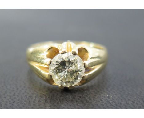 A diamond single-stone ring - The brilliant-cut diamond within a raised claw setting to the plain band - Diamond weight 1.85c