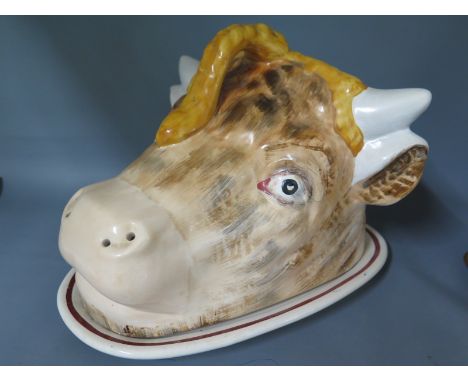 An unusual Bulls Head ceramic cheese dish - 20cm x 26cm 
Condition report: Generally good, crack to one ear 