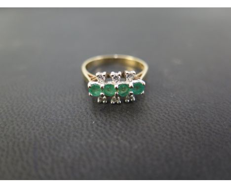 A 9ct gold emerald and diamond dress ring - Hallmarked Birmingham - Ring size N - Weight approx 3.3gms
Condition Report: Good