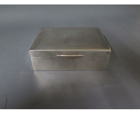 A mid 20th century silver cigarette box with engine turned decoration to lip - Birmingham 1963
