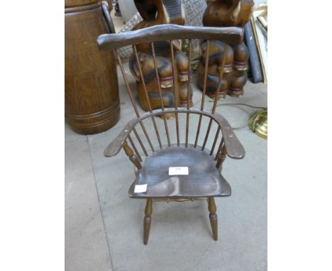 A miniature Windsor comb back armchair 