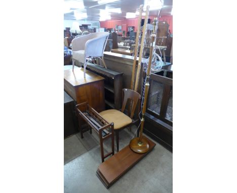 A teak plant stand, a teak lamp, a teak wall shelf and three chairs 