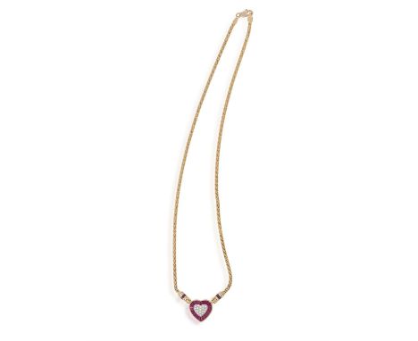 AN 18CT GOLD, GEM-SET PENDANTOf heart-shaped design, the centre pave-set with round, brilliant-cut diamonds, within a tapered