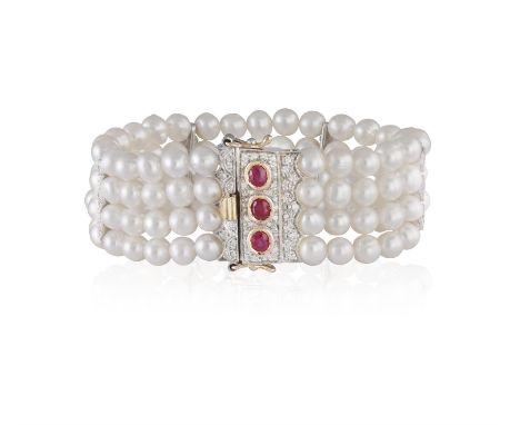 A CULTURED, FRESHWATER PEARL BRACELETComprising four rows of cultured, freshwater pearls between rose-cut, diamond-set  space