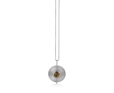 A SILVER, SMOKEY QUARTZ PENDANT BY RUDOLF HELTZELOf textured, disc form, centrally set with a round, mixed-cut smokey quartz,