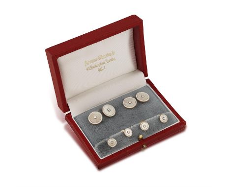 AN 9CT GOLD, DIAMOND AND MOTHER-OF-PEARL DRESS SETComprising a pair of cufflinks and four shirt studs of circular design, the