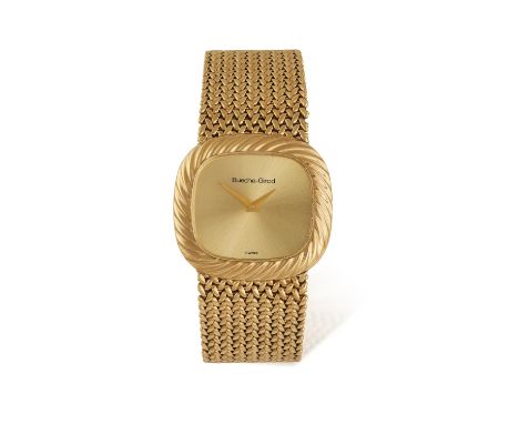 A 9CT GOLD WRISTWATCH BY BUECHE-GIRODQuartz movement, the rounded rectangular mystery dial with Dauphine hands, within a reed