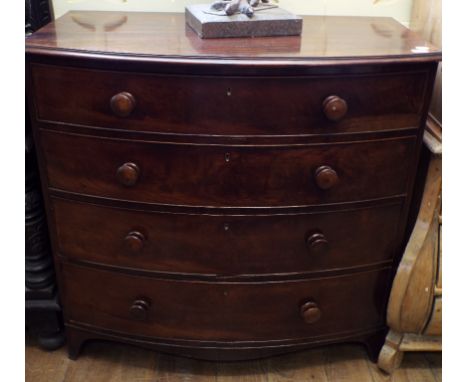 A 19th century bow front mahogany chest, of four graduated long drawers, 109 cm wide