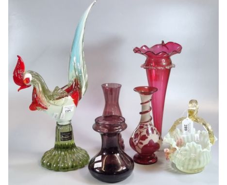 Collection of glassware to include: cranberry glass trumpet vase, other coloured glass vases, Art glass basket with twisted h