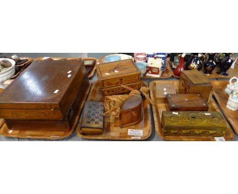 Three trays of assorted items to include; wooden jewellery, trinket and pencil boxes, wooden inkwell with hinged lid, a straw
