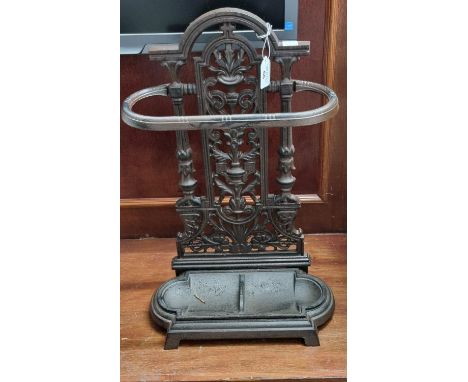 Victorian style cast iron stick and umbrella stand with lift up drip tray.(B.P. 21% + VAT) 