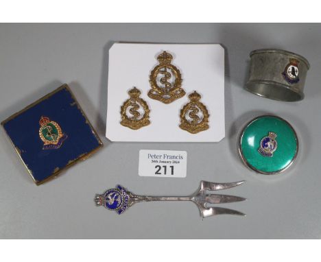 Group of three Royal Army Medical Corps cap badges, Royal Army Medical Corp enamel crested compact, another enamel compact fo