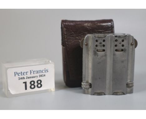Aluminium duplex cigarette lighter in folding leather case, probably WWII period.   (B.P. 21% + VAT) 
