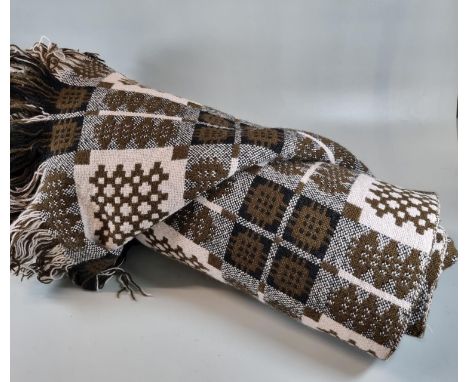 Vintage woollen brown ground Welsh tapestry blanket in traditional Caernarfon design, with 'Cambrian Mills, Llandyssul' label