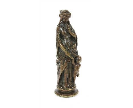 A 19th century bronze table seal , in the form of a Classical maiden and cupid, 9.5cm and a turned ivory desk thermometer, c.