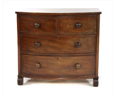 A George III mahogany bow front chest of drawers, the shaped top over two short drawers over three long drawers, on reeded sc
