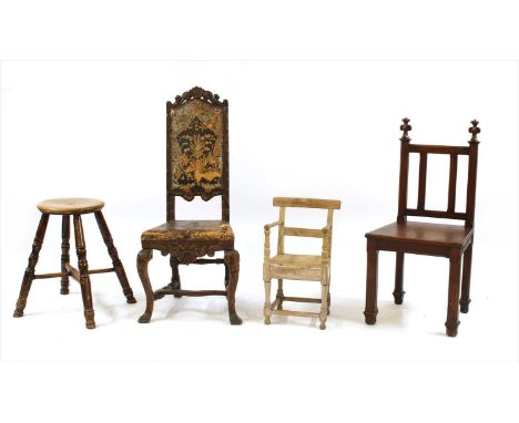 A Holland and Sons Gothic revival oak chair , together with a four legged county stool, a Spanish carved wood chair with an e