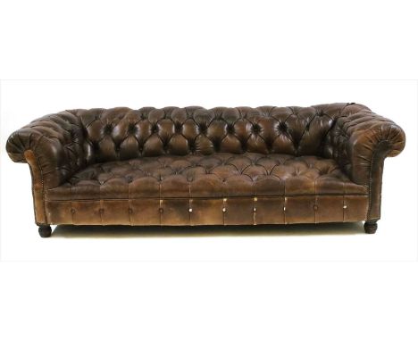 A leather Chesterfield settee, 216cm wide, 61cm high