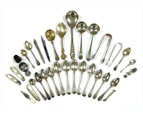 A collection of predominately 19th Century English silver flatware, to include a George III caddy spoon by Thomas Northcote, 