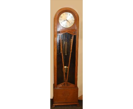 A 1930s oak cased longcase clock, with 3 train movement striking on a bar gong, by Bravingtons, London