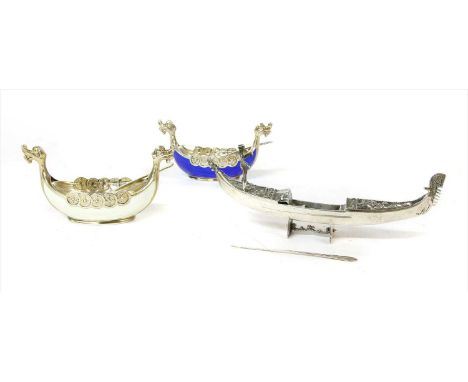 A pair of Norwegian novelty silver and enamel salts, in the form of Viking longboats, made by Theodor Olsen of Bergen, comple