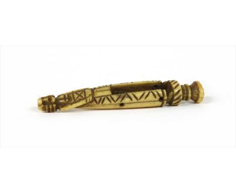 A late 17th century carved bone pipe tamper, in the form of a figure in period dress, 8.5cm high