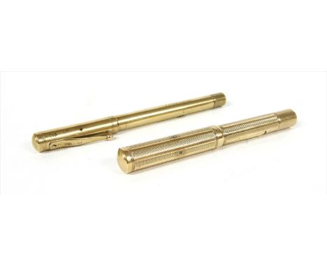 A 9ct gold Waterman Ideal lever fill fountain pen, with engine turned decoration and engraved rectangular cartouche, Waterman