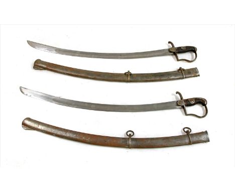 A pair of Prussian 1811 pattern blucher sabres, each with scabbard, fullered blade, impressed numbers to hilt and scabbard, 1