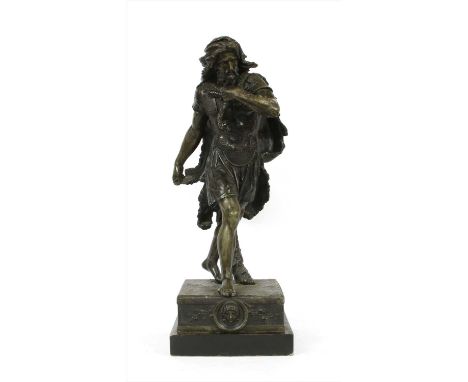 A large bronzed spelter figure of Hercules, striding in armour with a lion skin cloak, on a stepped square base, 70cm high