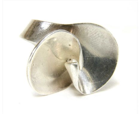 A sterling silver Georg Jensen ring, c.1970, no. 130, the twisted interlinking form ring, designed by Ibe Dahlquist, import h