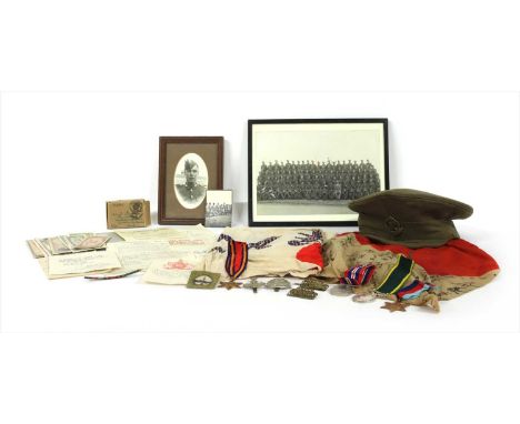 A small collection of memorabilia relating to the Burma campaign in WWll, including A Japanese flag, (incomplete) with Japane