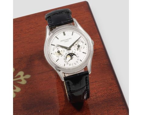 Patek Philippe. A fine 18K white gold automatic perpetual calendar wristwatch with moon phaseReference: 3940GDate: Circa 2000