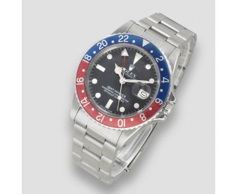 Rolex. A stainless steel automatic calendar bracelet watch with dual time zoneModel: GMT Master 'Pepsi'Reference: 16750Date: 