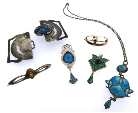 A small collection of Arts & Crafts jewellery, including a silver pierced buckle centred with a rose decorated with blue and 