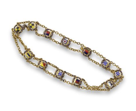 A gold and enamel nautical pendant bracelet, spelling the words 'Well Done Anne'
