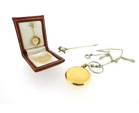 A gold pan-form pendant by Cartier, engraved 'Luigi', signed Cartier London to the reverse, 2.5cm long, Cartier case, a Frenc