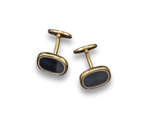 A pair of yellow gold cufflinks by Patek Philippe, the larger oval link with steel-coloured enamel decoration, the smaller li