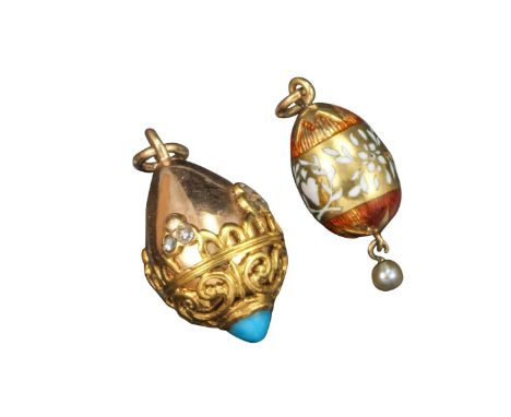 Two early 20th century Russian miniature egg pendants, a pink gold pendant with scroll pierced yellow gold cage work, set wit