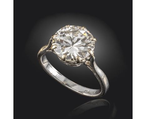 A diamond solitaire ring, the old circular-cut diamond weighs approximately 3.15cts and is set in a platinum coronet mount, s