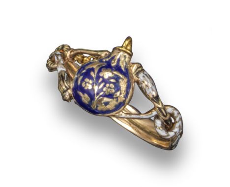 A George III ring incorporating a miniature perfume bottle with stopper, the pear-shaped bottle with blue and gold enamel dec