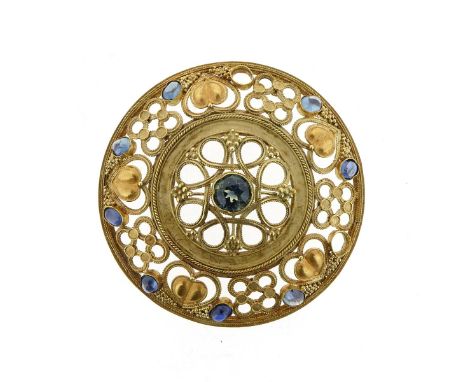 A sapphire set gold circular plaque by H.G. Murphy, decorated with green and blue sapphires (two missing) within circular gol