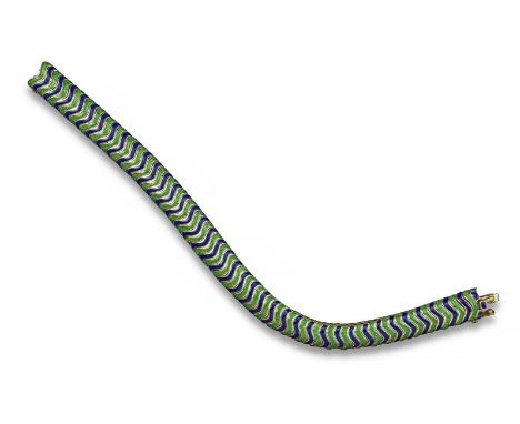 A articulated yellow gold bracelet with enamel decoration, alternately mounted with blue enamel and green guilloche enamel li