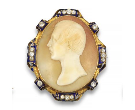 A shell cameo brooch by Tommaso Saulini, c1870, depicing the young Edward VII in profile, within gold scroll border decorated