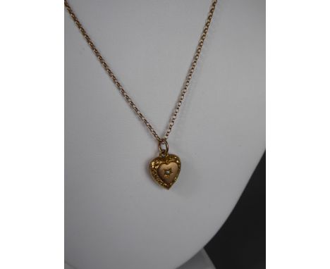 A 9ct Yellow Gold Necklace and yellow metal heart pendant, chain wt approx 2.2 gms.