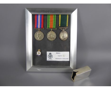 Group of WWII Medals, to 2038158 SSGT S. Wise REME, and an enamel veterans badge, mounted into a glass frame together with a 