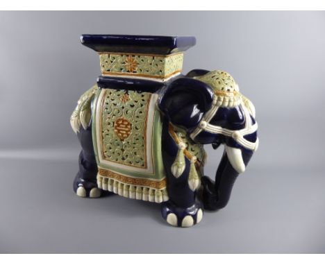 A Ceramic Plant Stand, in the form of an Asian elephant, approx 44 cms